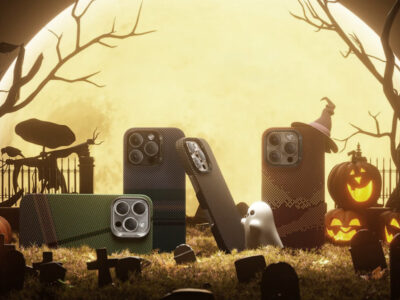 Halloween themed phone case display, cemetery ghost pumpkin lantern background